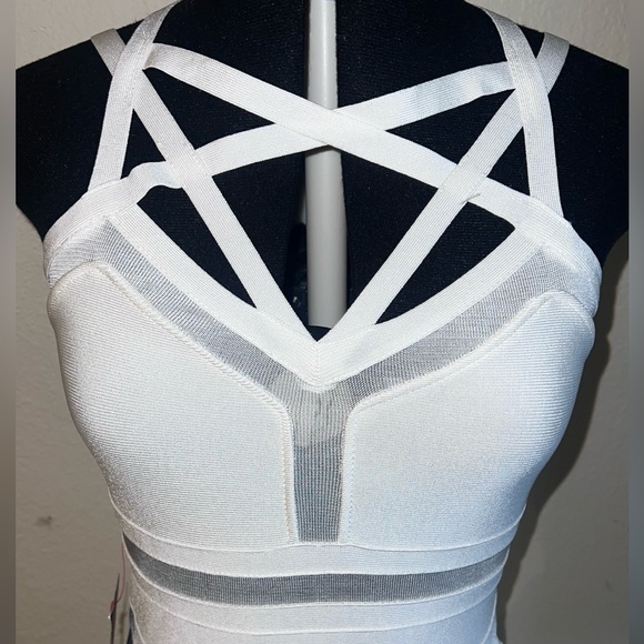 bebe Dresses & Skirts - Bebé Mesh & Cage bandage dress